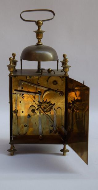 null Nasturtium brass hanger, four vase shaped corner caps, enamel dial signed Percheval...