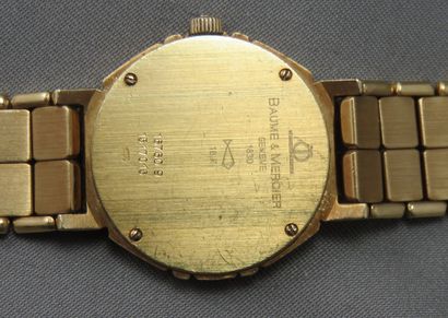 null Baume & Mercier - Genève

 Montre Bracelet de Dame

 en or à 750°/00, de forme...