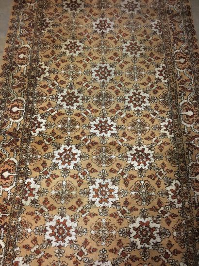 null North African carpet, weft and warp and wool velvet, chestnut coloured background...