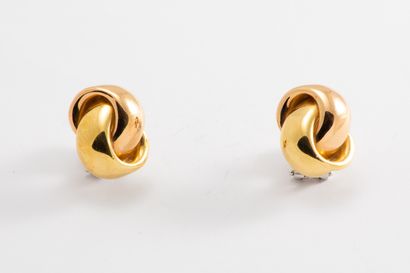 null Paire de boucle d'oreilles en or jaune et rose 18K (750 millièmes) formant un...