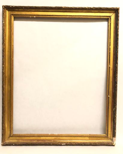 null Wooden frame with gilded and carved stucco, decorated with pearls and laurel...
