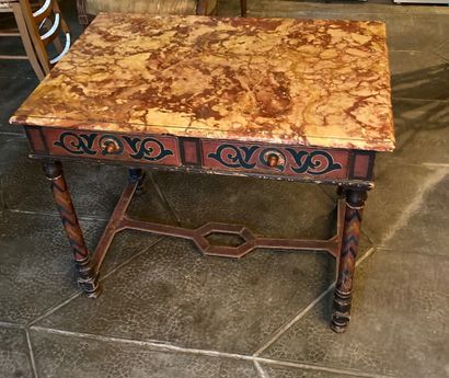 A moulded and painted wood middle table with...