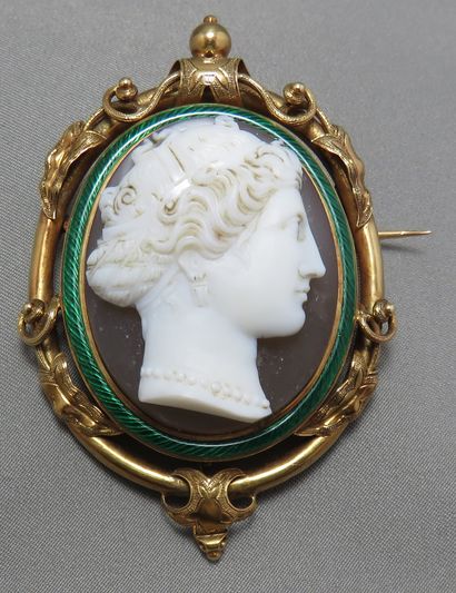 Cameo brooch 
 the openwork gold setting...