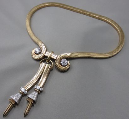 null Important Collier "Tubogaz" et ses différents accessoires 

 en or à 750°/00...