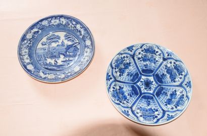 null TWO porcelain dishes with blue and white decoration of a lively scene and floral...