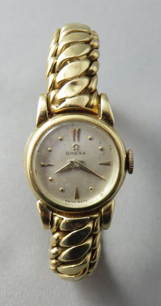 null Omega 

 Ladies' wristwatch in gold 750°/00

 mechanical movement with manual...