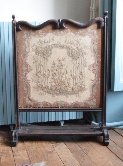 null Wooden parlor, the central swivel panel upholstered with a tapestry decorated...