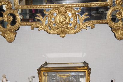 null Important MIRROR with glazed panels in stucco and gilded wood decorated with...