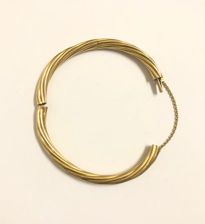 Bracelet jonc en or jaune 18K (750 millièmes)...