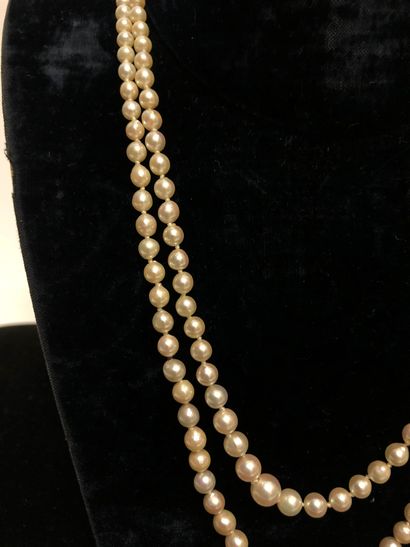 null Necklace double strings of cultured pearls arranged in fall from 7.6 mm in diameter...