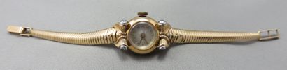 Ladies' wristwatch in gold 750°/00 
 round...