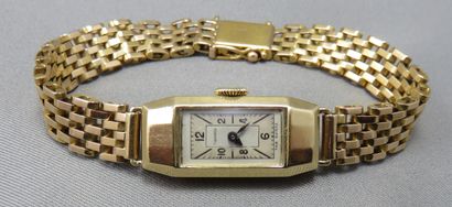 null Tavannes

 Montre Bracelet de Dame

 en or à 750°/00, cadran rectangulaire bicolore,...