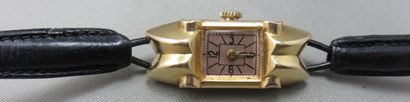 null Ladies' wristwatch in gold 750°/00

 square copper dial, gadroon attachments,...