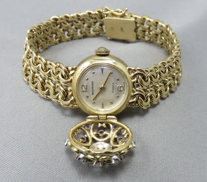 null Bucherer

 Lady's Secret Bracelet Watch

 in 750°/00 gold, the round dial is...
