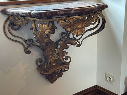 null Small console of mastery in gilded wrought iron with rocaille decoration. Red...
