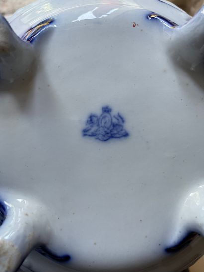 null Part of earthenware table service with blue-white cameo decoration of acanthus...