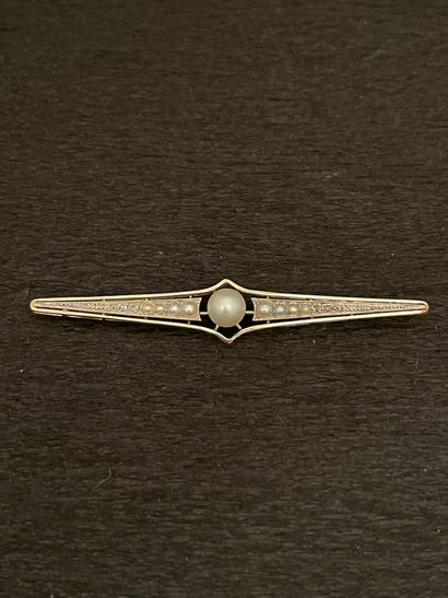 null White gold barrette brooch composed of a cultured pearl in a setting of falling...