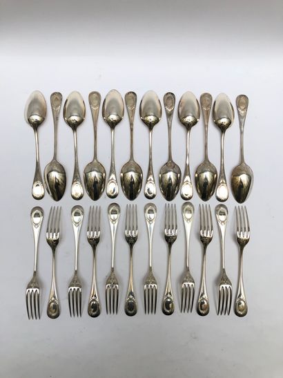 null Twelve silver cutlery with medallions with pearls and foliage. Master silversmith...