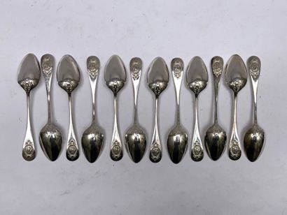 Twelve small silver spoons decorated with...