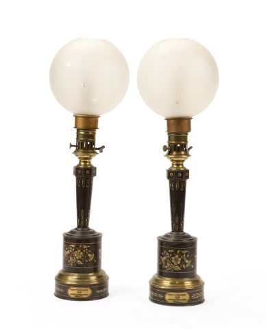 null Pair of oil lamps in sheet metal painted in imitation of wood with stylized...