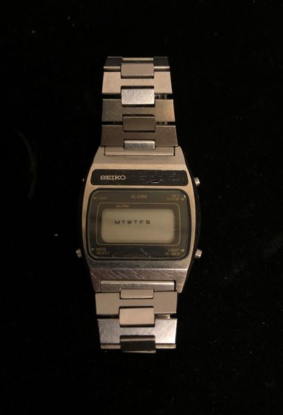 null SEIKO. Wristwatch, steel case and bracelet, 4 push buttons, engraved. Lg.: 32...