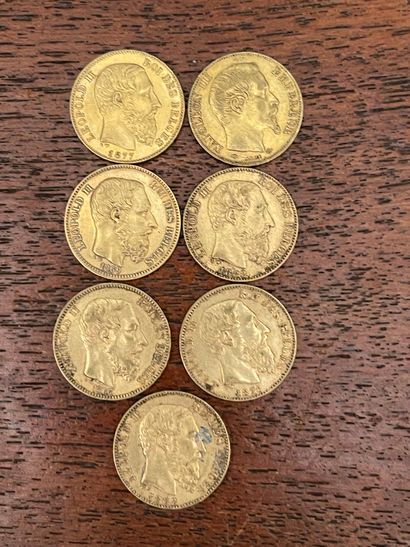 null Lot de sept pièces de 20 Francs or belge (usures). VENDU SUR DESIGNATION