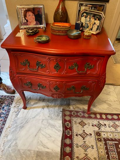 null Small chest of drawers in red painted wood opening with two drawers on two rows,...