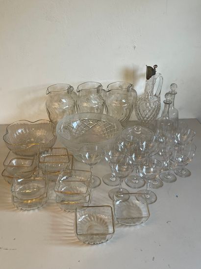 Mismatched glassware: carafes, salad bowls,...