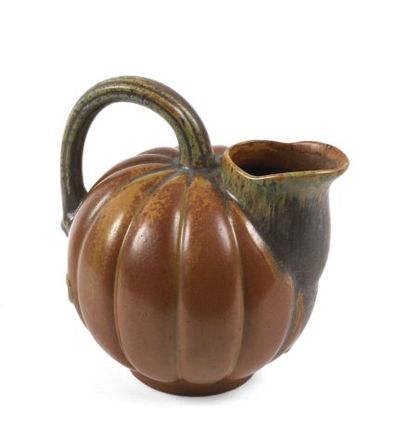 null Pitcher in brown enamelled stoneware in the shape of a coloquint. Take in the...