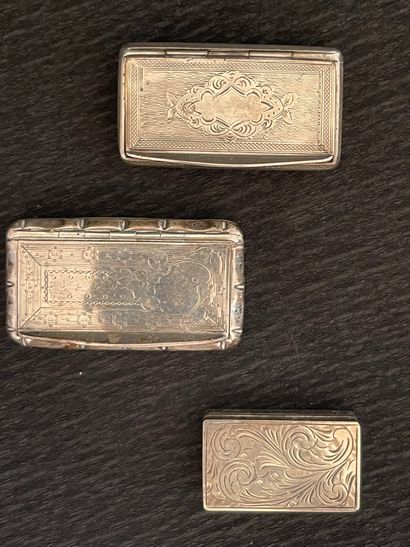 null Three rectangular silver boxes : the first one decorated with a medallion on...