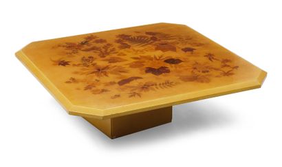 null Coffee table with cut sides with printed decoration of foliage on yellow background....