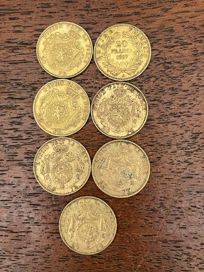 null Lot de sept pièces de 20 Francs or belge (usures). VENDU SUR DESIGNATION