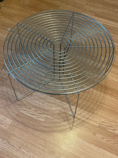 null Round coffee table, concentric tubular metal base, glass top. 20th century....