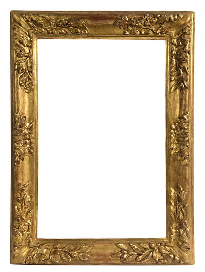 Rectangular frame in carved wood decorated...