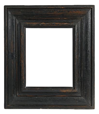 null Rectangular frame in black tinted molded fir with inverted profile. 18th century....