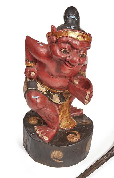 null Chriss holder representing a divinity. In polychrome carved wood. A.B.E. (chips)....