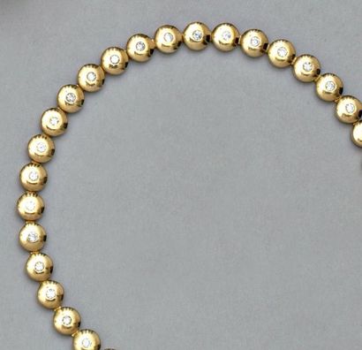 null Bracelet ligne or jaune serti de 28 diamants taille brillant ronds. Poids: 19...