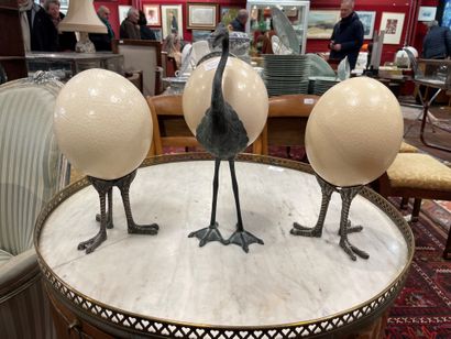 null three ostrich eggs, two of which are metal-mounted
