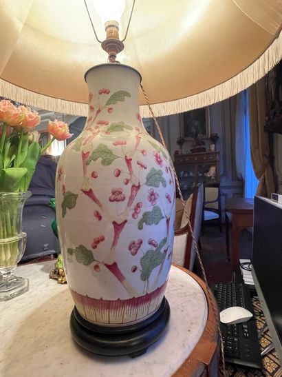 null Polychrome porcelain vase decorated with cherry blossoms. Marked on the reverse....