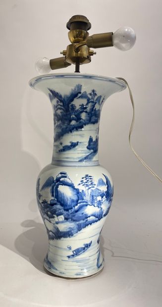 null Blue and white enameled porcelain vase, decorated with animated lakescapes,...