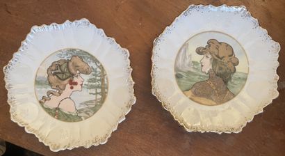 null Two polychrome and gold porcelain plates decorated with women in profile in...