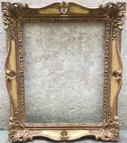 null Louis XV-style carved wood frame with foliage scrolls (minor accidents and missing...
