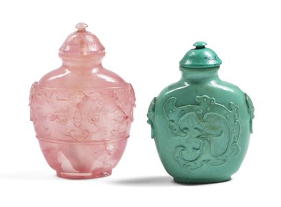 null CHINA, 20th century
Two escutcheon-shaped snuff bottles, one in turquoise, the...