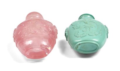 null CHINA, 20th century
Two escutcheon-shaped snuff bottles, one in turquoise, the...