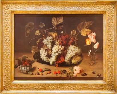 D'après une école HOLLANDAISE du XVII ème Natures mortes aux fleurs et raisins, Paire...