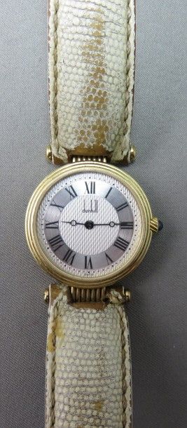 DUNHILL DUNHILL modèle Vendôme. Montre bracelet de dame en or, boîtier de forme ronde,...