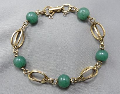 null BRACELET en or, maille filetée de forme ovoïde alternée de boules en aventurine...