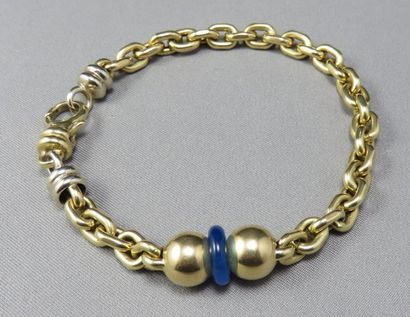 null BRACELET en or, maille jaseron, agrémenté d'éléments godronnés, de 2 boules...