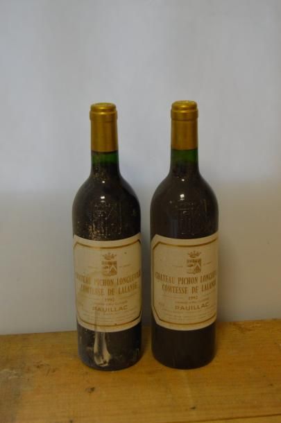 null 2 bouteilles CH. PICHON-LONGUEVILLE-COMTESSE, 2° cru Pauillac 1992 (els) 