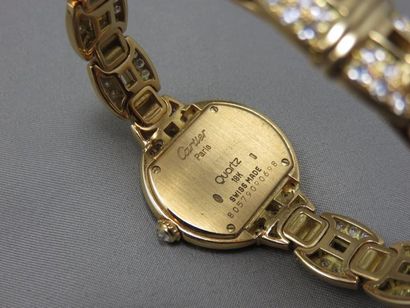 CARTIER - PARIS Cartier - Paris Montre bracelet de dame "Ellipse" en or 18k, le cadran...